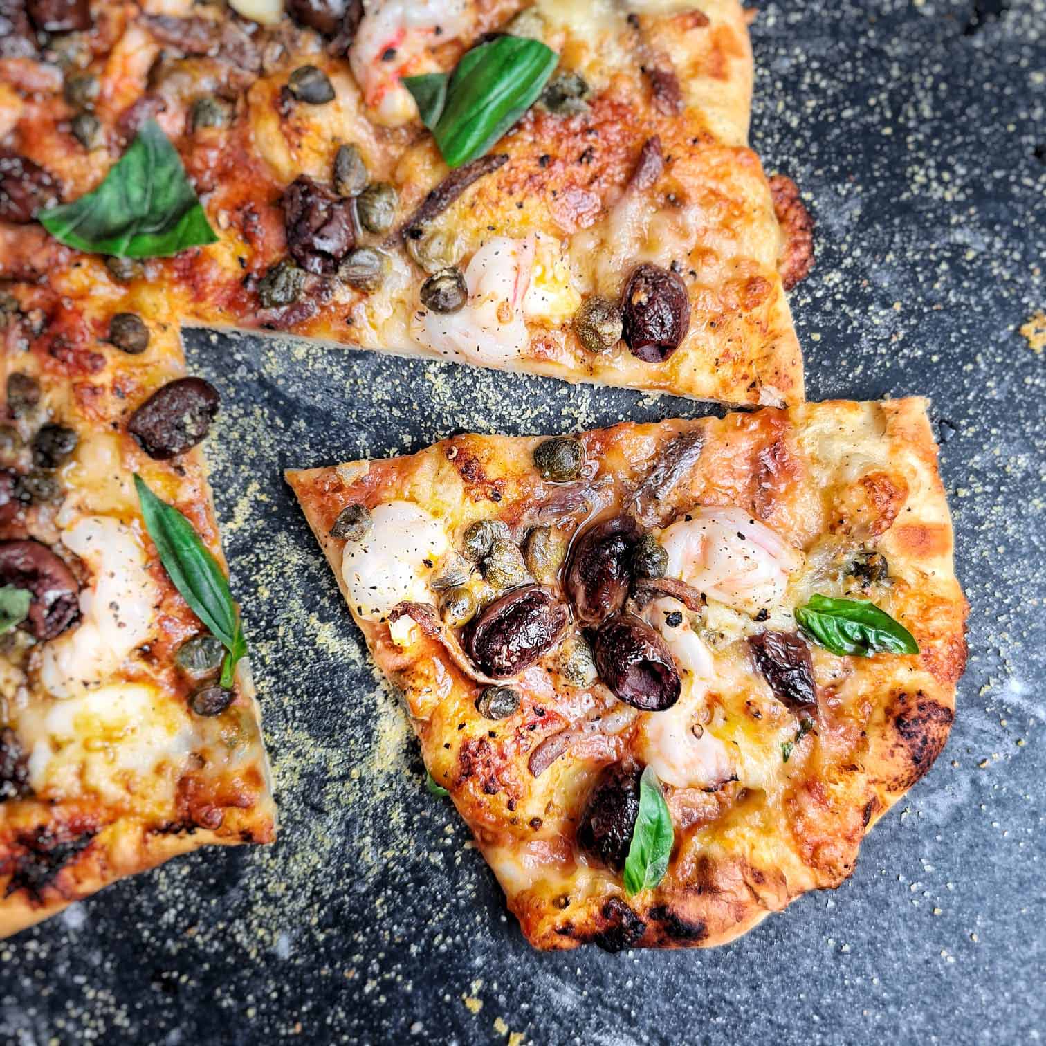De lekkerste puttanesca pizza from scratch! • I.K.ookt